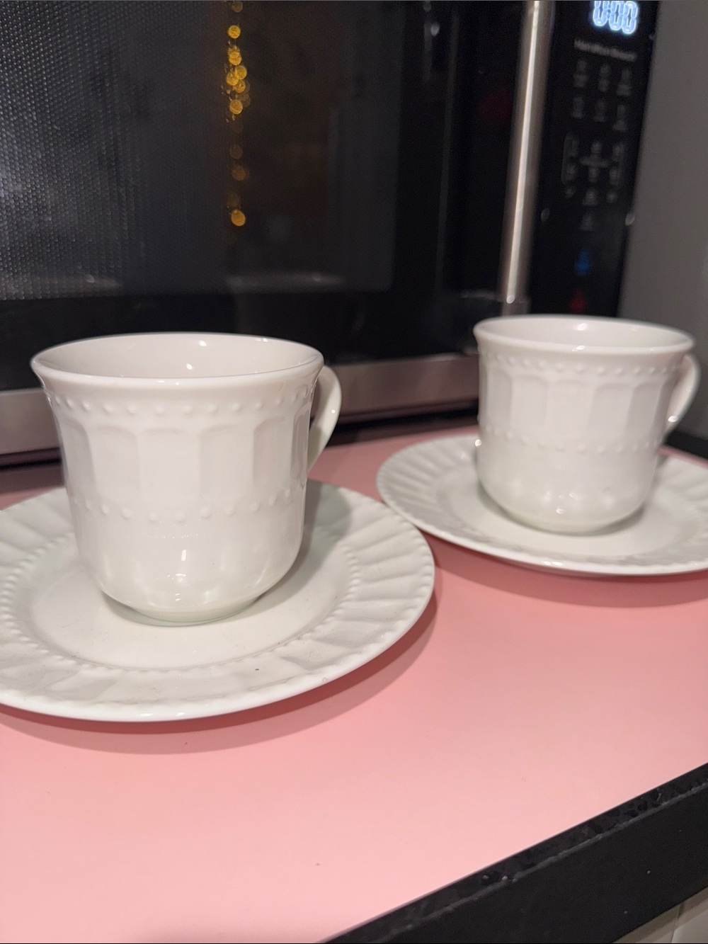 Gibson White Embossed Porcelain Teacup and Saucer Set of 2
